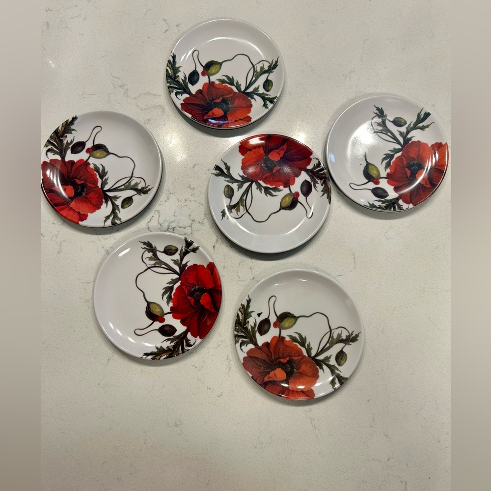 A set of ceramic mini plates/coasters with the rubber bottom